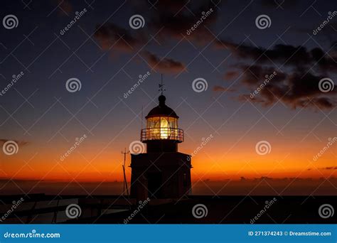 Ocean Lighthouse during the Sunset. Dramatic Clouds on the Background. Stock Image - Image of ...