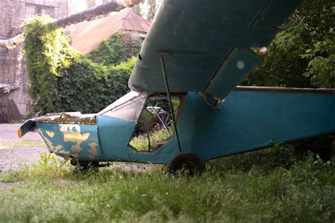 Premium Photo | An old abandoned small plane left in the forest