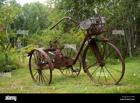 Antique tricycle in a yard in coastal Maine, USA Stock Photo - Alamy