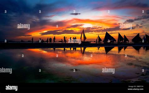 Stunning sunset in Boracay Island Philippines Reflection Stock Photo - Alamy