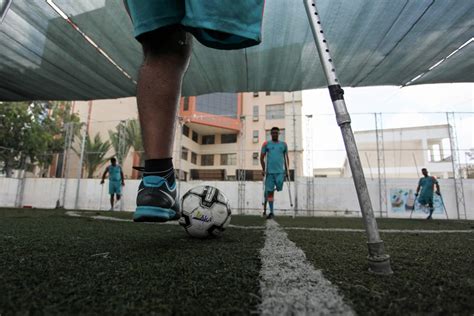 Young Gaza amputees play soccer again after coronavirus curbs eased ...