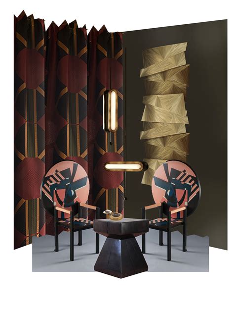 two chairs and a table in front of a wall with gold geometric designs on it