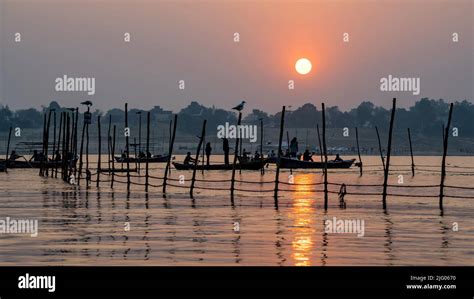 Prayagraj ,13, January, 2017:Panoramic view of rising Sun and boats ...