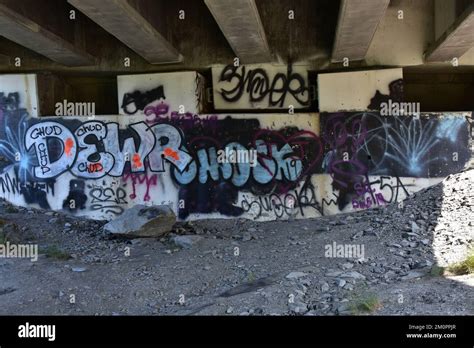 Graffiti under a bridge Stock Photo - Alamy