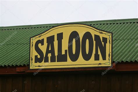 Old Saloon Sign on Weathered — Stock Photo © gsdonlin #3314548