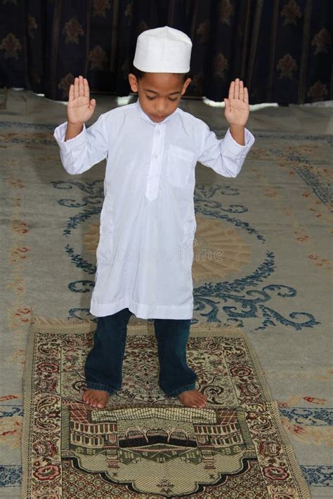 Muslim boy praying stock photo. Image of religious, religion - 24075554