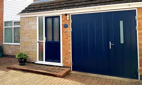 Custom-made insulated side-hinged garage doors.