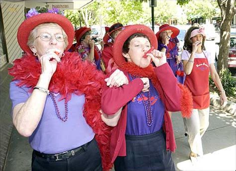 Red Hatters strut their stuff in downtown sidewalk parade | News ...