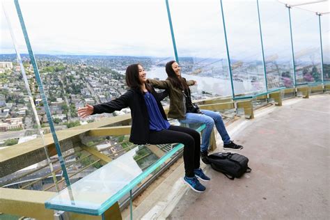 Space Needle introduces glass benches for floating over the Seattle skyline - Curbed Seattle