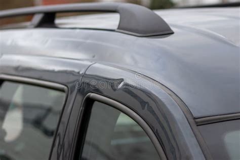 Damaged Car Roof with Many Hail Damage Dents Show the Forces of Nature and the Importance of Car ...