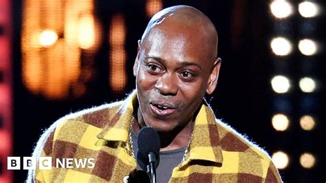 Dave Chappelle show cancelled over transgender jokes controversy - BBC News