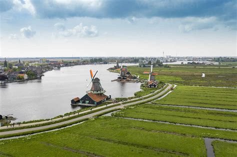 Netherlands, North Holland, Zaandam, Aerial view of historical windmills in Zaanse Schans stock ...