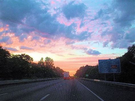 Pink Sunset Sky And The Open Road Photograph by James Potts