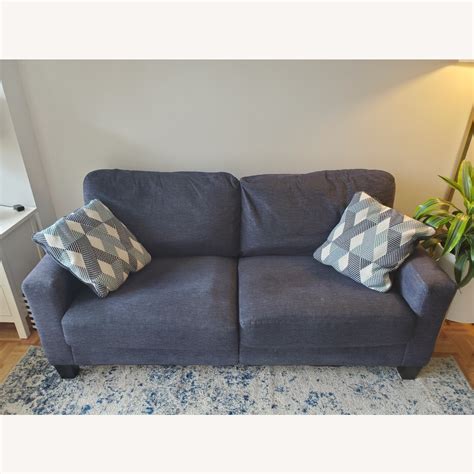 Ashley Furniture Modern Sofa with Cushions - AptDeco