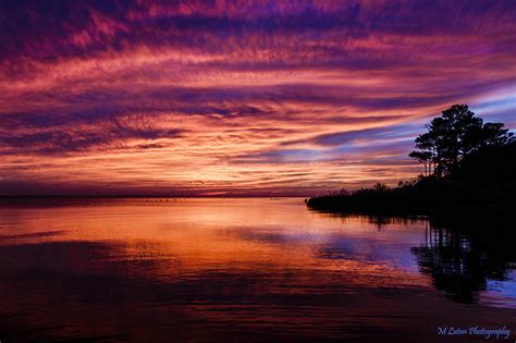 Orange and Purple Sunset Photograph by M Luton - Fine Art America