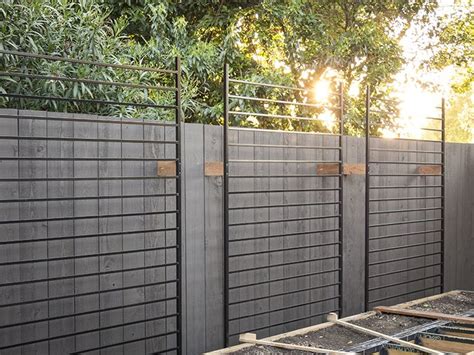 Using metal fence panels as trellises for the vertical part of an ...