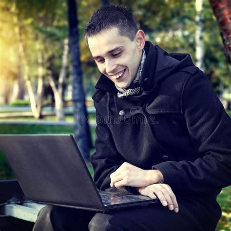 Man with Laptop outdoor stock photo. Image of caucasian - 53937094