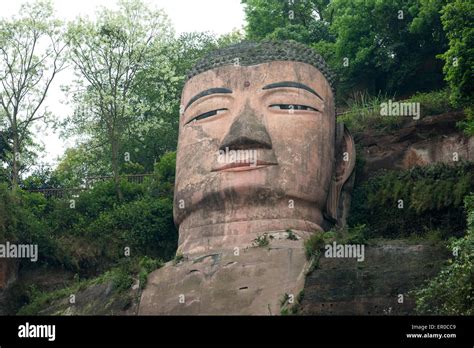 Leshan giant Buddha (Dafo) carved out of the cliff face at the Mingjian, Dadu and Qingyi rivers ...