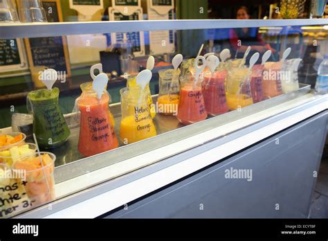 fresh squeeze juice bar European market Stock Photo - Alamy