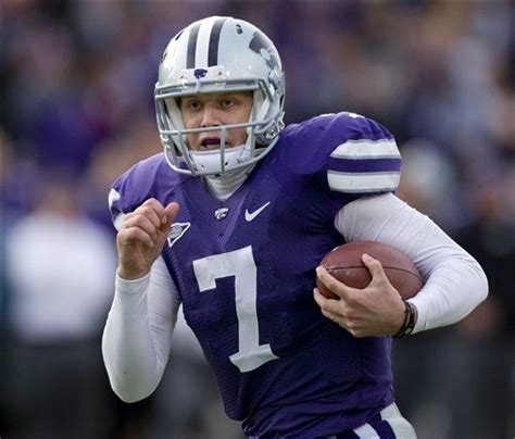 Kansas State quarterback Collin Klein (7) runs for a touchdown during the second half of an NCAA ...