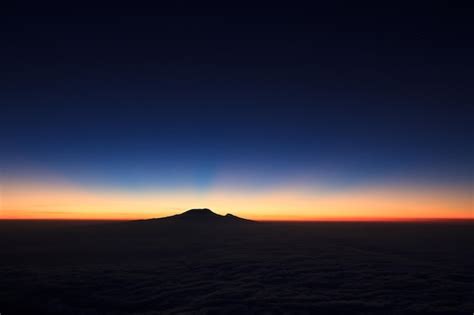 Premium Photo | Sunrise behind mount kilimanjaro