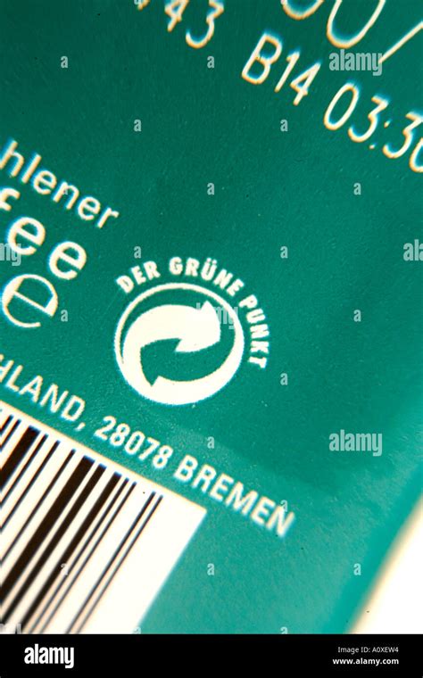 Der Grune Punkt symbol on packet of German Coffee Stock Photo - Alamy