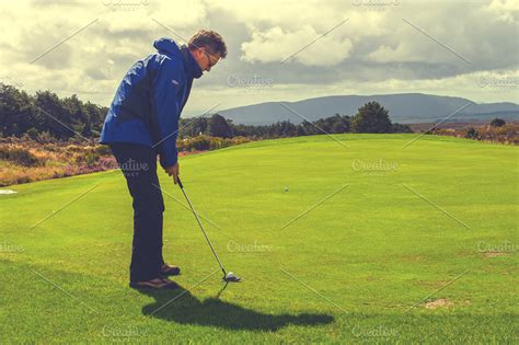 Man playing golf | High-Quality Sports Stock Photos ~ Creative Market