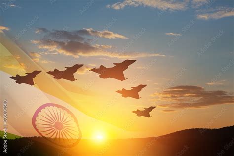 Indian Air Force Day. Indian jet air shows on background of sunset with transparent Indian flag ...