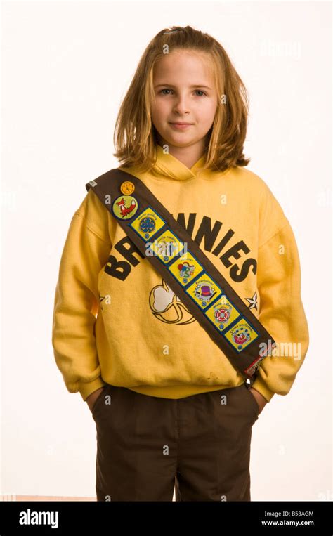 10 year old girl dressed in her Brownies uniform Stock Photo - Alamy