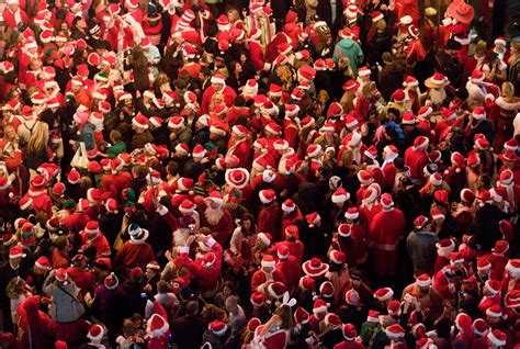 All the Santas meet under the Reno Arch at midnight at the 2011 Santa ...