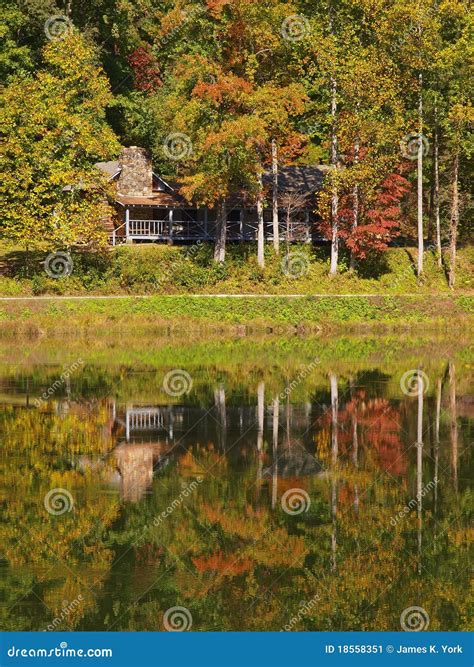 Cabin on mountain lake stock image. Image of brush, range - 18558351