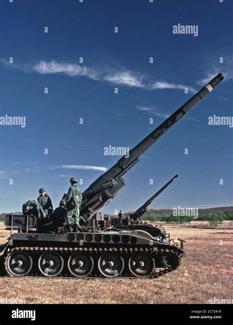 1975 - Ammunition is loaded into M107 175 mm self-propelled howitzers ...