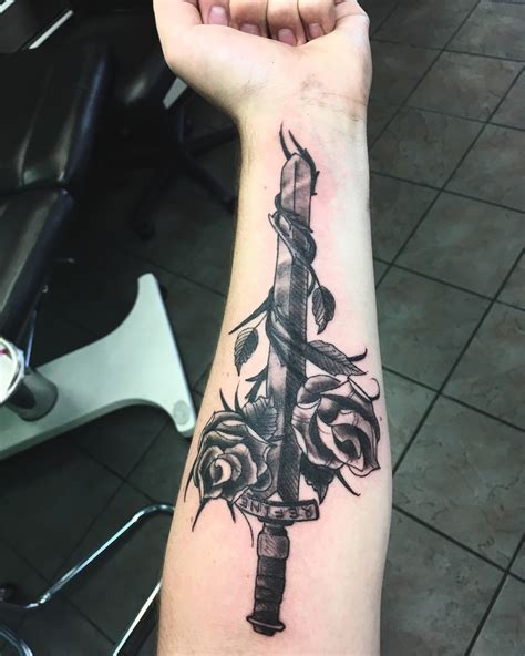 Sword and Roses by John Boletta at Strange World Tattoo, Calgary, AB : r/tattoos