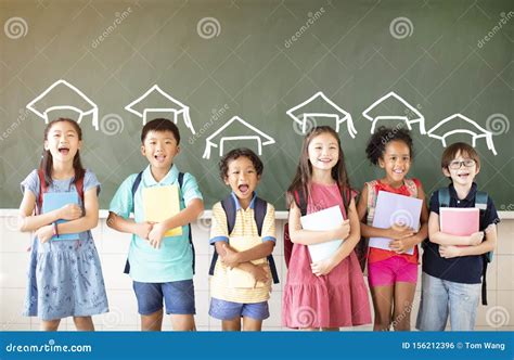 Diverse Young Students Standing Together in Classroom Stock Photo ...