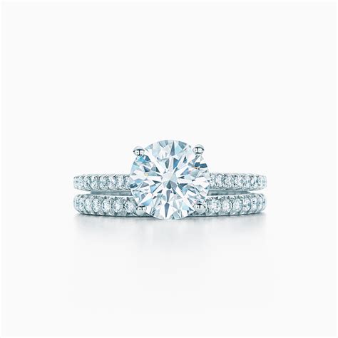 Tiffany Novo® round brilliant engagement ring with a pavé diamond ...