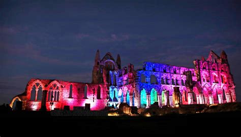 In Pictures: Moon rises as Whitby Abbey lights up for Halloween ...