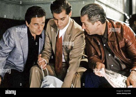 GOODFELLAS 1990 Warner Bros, film with from left: Joe Pesci, Ray Liotta, Robert De Niro Stock ...