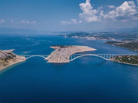 The first section of the Krk Bridge in Croatia was the longest concrete arch bridge in the world ...