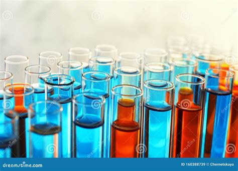 Many Test Tubes With Different Liquid Samples On Color Background Stock Image - Image of ...