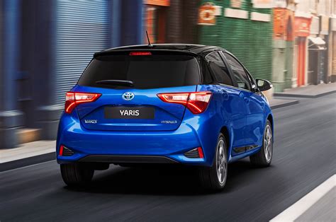 2017-Toyota-Yaris-Hybrid-rear-three-quarter-in-motion-1 - Motor Trend ...