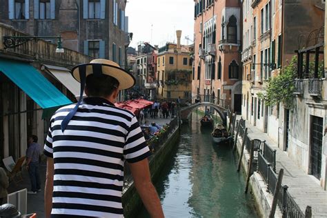 Venetian Man Overlooking Venice Canals (Photo) | Venice Italy