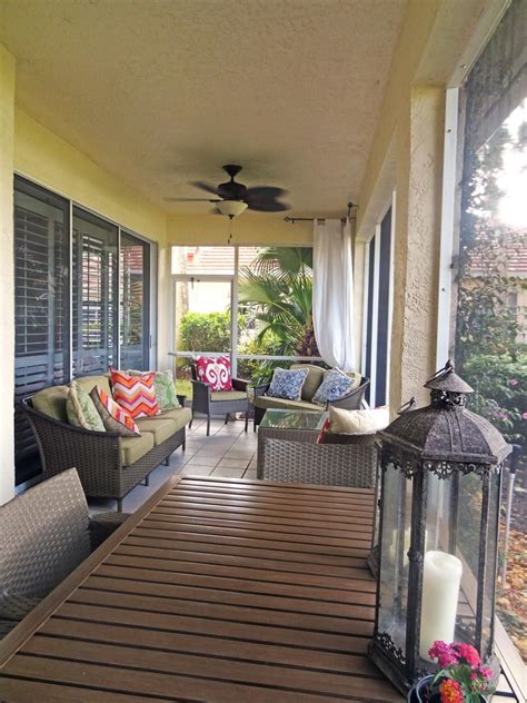 Sunroom With Woven Patio Furniture & Colorful Throw Pillows | Sunroom ...