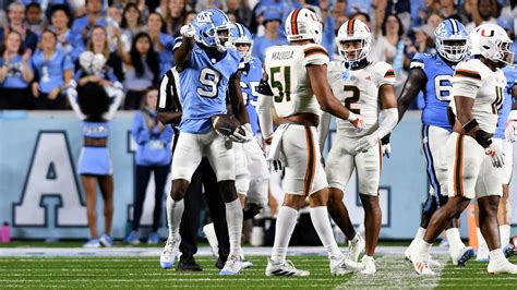 Devontez Walker secures three touchdown catches, contributing to No. 12 UNC's 41-31 victory ...