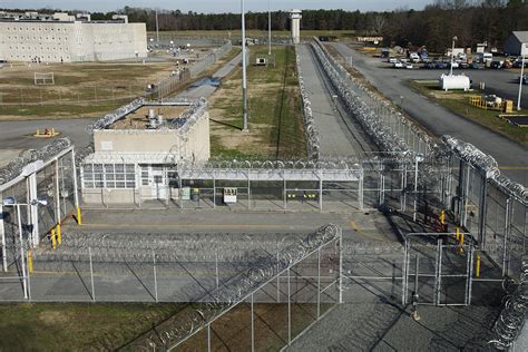 Prison Grounds Entrance Gate Photograph by Roberto Westbrook