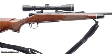 REMINGTON MODEL 700 .30-06 CAL. LEFT HAND BOLT ACTION RIFLE WITH 22" BARREL WALNUT MONTE CARLO ...