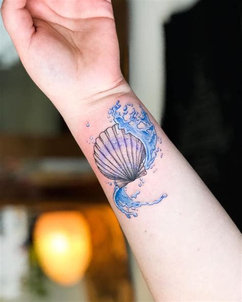 Colourful seashell tattoo by Dutch artist @captaincubetattoo Just keep swimming! Thanks for this ...