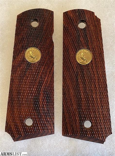 ARMSLIST - For Sale: Colt 1911 wood grips with gold medallion - factory ...