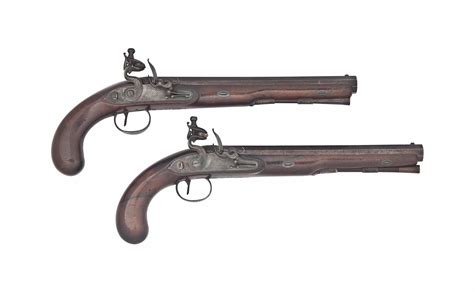 A PAIR OF FLINTLOCK DUELLING PISTOLS , BY WOGDON & BARTON, LONDON, CIRCA 1800 | Christie's