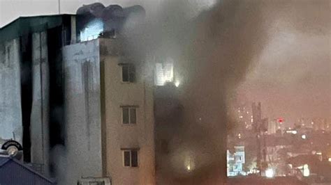 Vietnam apartment fire claims dozens of lives, child seen thrown out ...