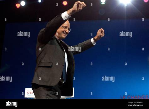 French socialist candidate Francois Hollande salutes after his speech ...